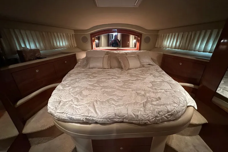 Slide: The Image of Luxurious bedroom interior of 2002 Sea Ray 400 Sedan Bridge yacht. - 32