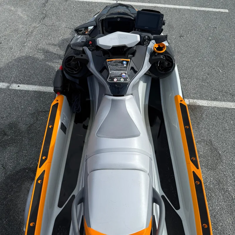 Slide: The Image of 2024 Sea-Doo Fishpro Trophy 170, top view, parked on asphalt. - 10