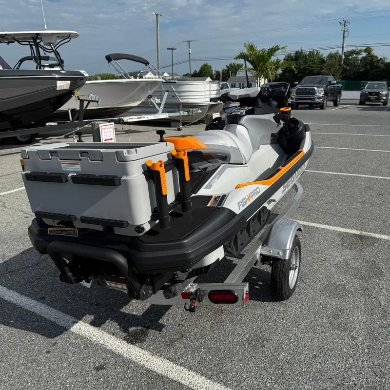 Slide: The Image of 2024 Sea-Doo Fishpro Trophy 170 on trailer in parking lot. - 7