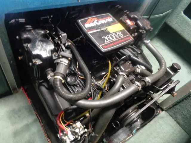 Slide: The Image of Engine of 1987 Sea Ray S23 boat, featuring a MerCruiser 260 V8 motor. - 12