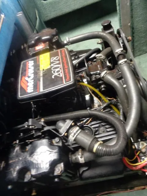 Slide: The Image of Engine of a 1987 Sea Ray S23 boat, featuring a MerCruiser 260 V8. - 13