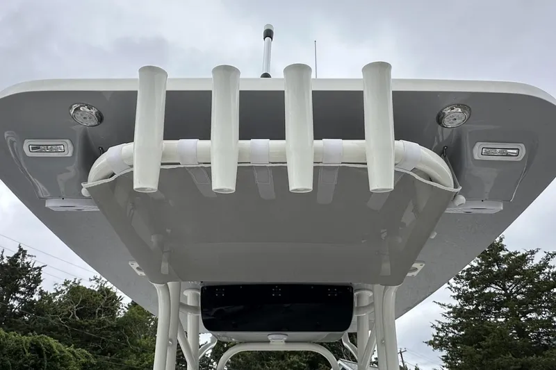 Slide: The Image of 2026 Key West 219 FS boat top view with rod holders and lights. - 16