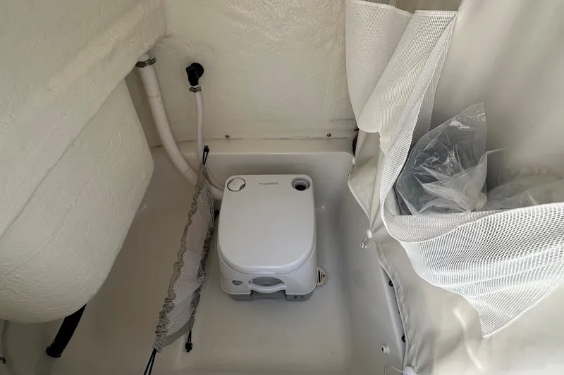 Slide: The Image of Compact marine toilet in 2026 Key West 219 FS boat interior. - 20