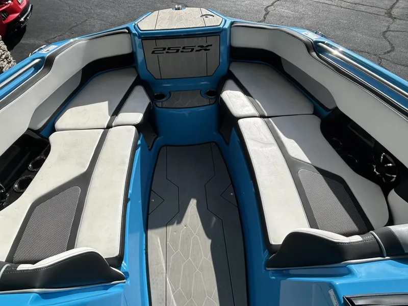 Slide: The Image of 2023 Yamaha Boats 255 XD interior with spacious seating and modern design. - 4