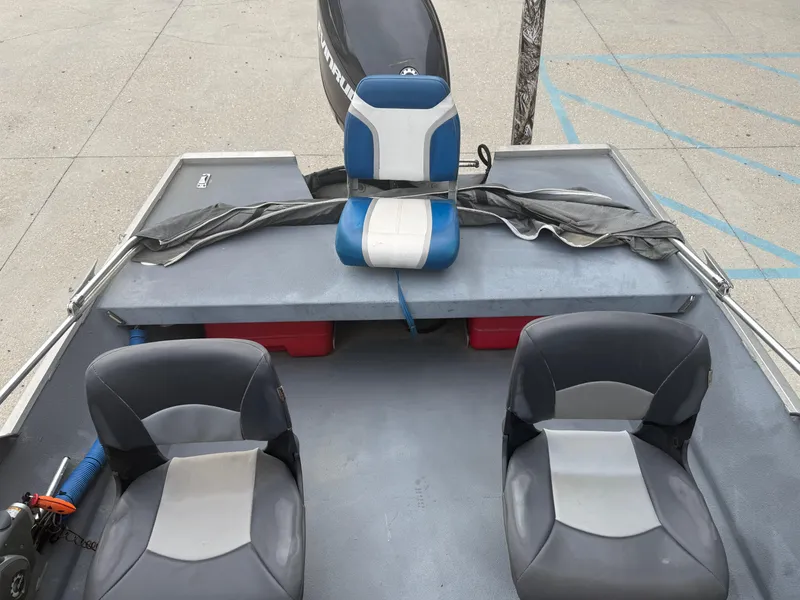 Slide: The Image of Hanko 17 boat interior with three seats and Evinrude motor, 2015 model. - 20