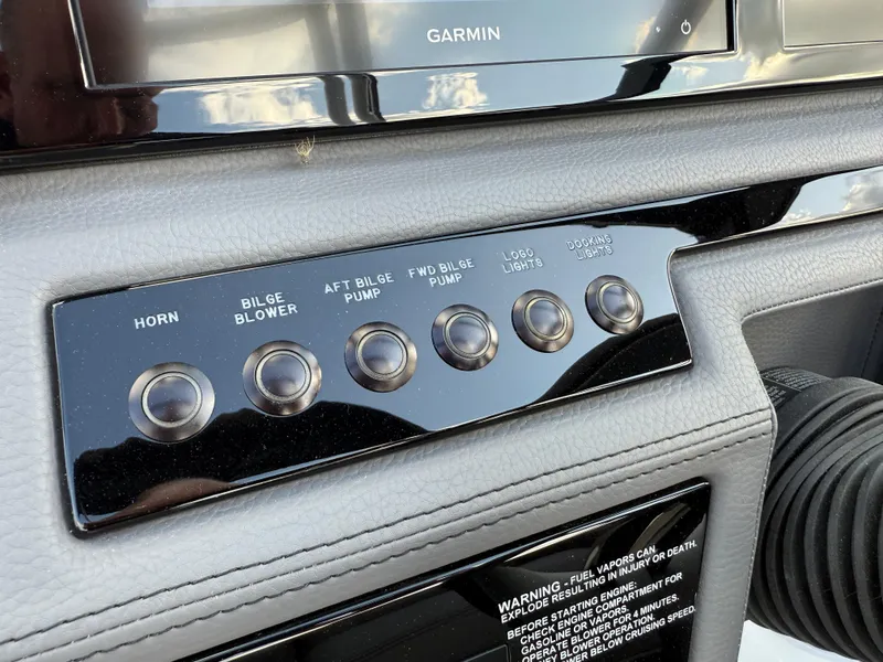 Slide: The Image of Control panel of a 2025 Cobalt R6 boat with various function buttons. - 17