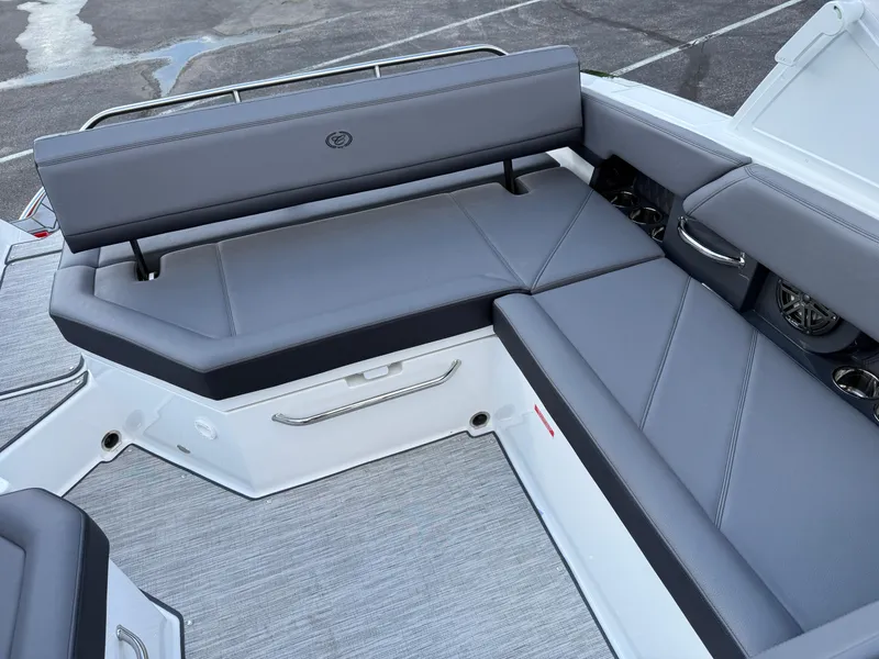Slide: The Image of 2025 Cobalt R6 boat interior with sleek gray seating and modern design. - 27