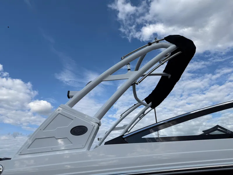 Slide: The Image of 2025 Cobalt R6 boat with sleek design against a cloudy blue sky. - 4