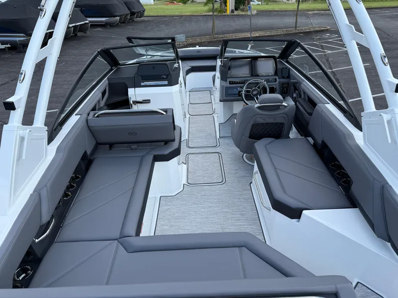 Slide: The Image of 2025 Cobalt R6 boat interior with sleek gray seating and modern dashboard. - 9