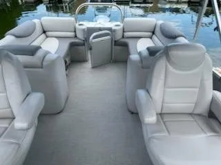 Slide: The Image of 2018 Avalon Catalina 2385QL pontoon boat with spacious seating and modern design. - 4