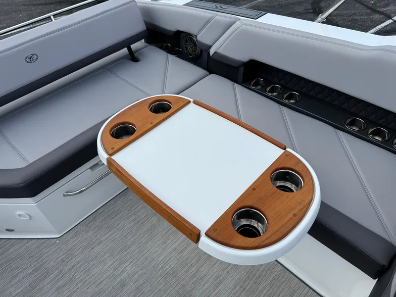 Slide: The Image of Luxury seating area on 2022 Cobalt R8 boat with cupholders and sleek design. - 12