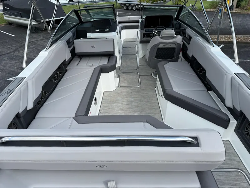 Slide: The Image of 2022 Cobalt R8 boat interior with spacious seating and modern design. - 13