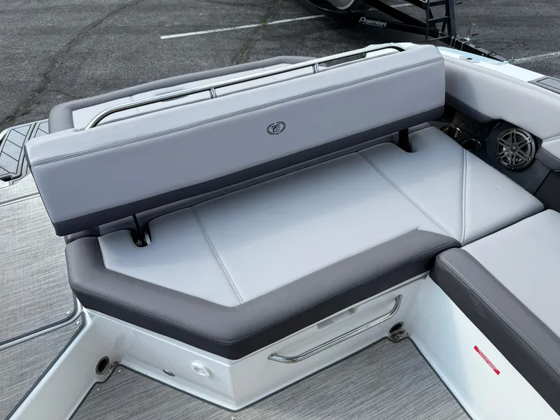 Slide: The Image of 2022 Cobalt R8 boat interior with gray seating and speaker detail. - 17