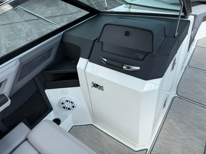 Slide: The Image of 2022 Cobalt R8 boat interior with sleek dashboard and speaker system. - 21
