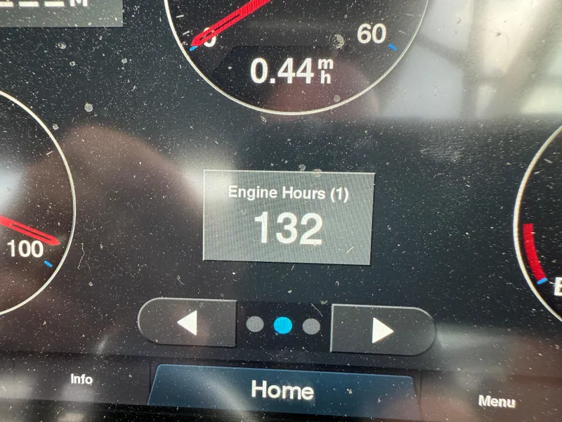 Slide: The Image of Dashboard display showing 132 engine hours on a 2022 Cobalt R8. - 25