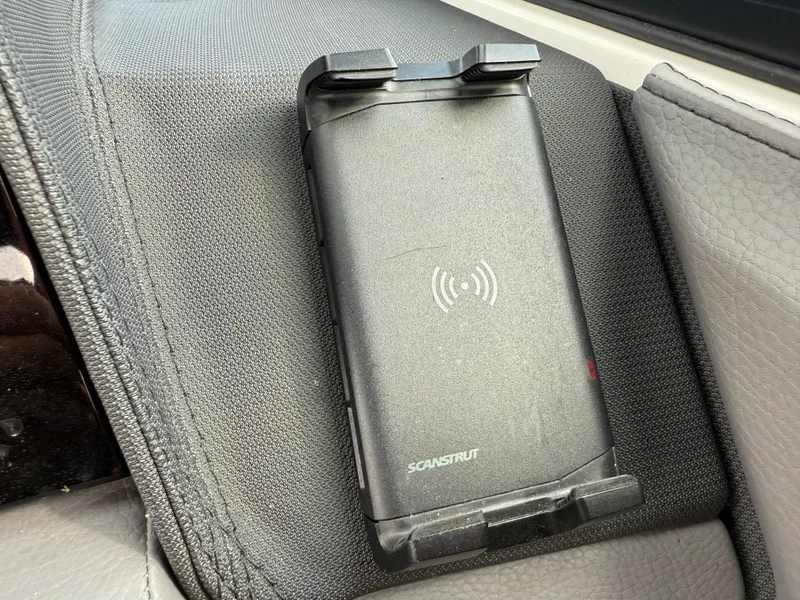 Slide: The Image of Wireless charging pad in a 2022 Cobalt R8 vehicle interior. - 27