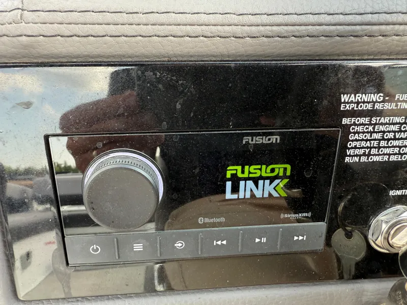 Slide: The Image of Fusion Link audio system in a 2022 Cobalt R8 boat dashboard. - 29