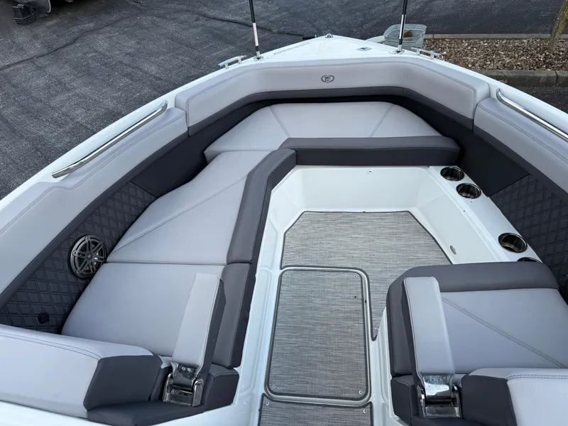 Slide: The Image of 2022 Cobalt R8 boat interior with gray seating and cup holders. - 38