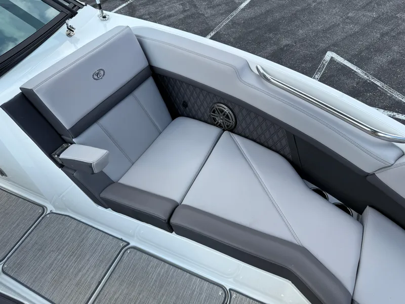 Slide: The Image of 2022 Cobalt R8 boat interior with luxurious gray seating and speaker detail. - 41