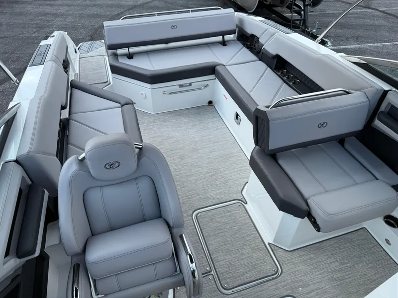Slide: The Image of 2022 Cobalt R8 boat interior with luxurious gray seating and modern design. - 43