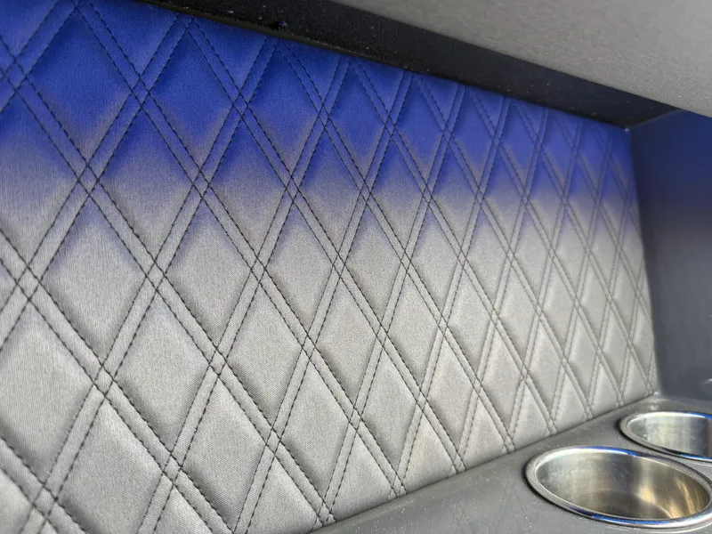 Slide: The Image of Diamond-stitched upholstery with cup holders in 2022 Cobalt R8 interior. - 48