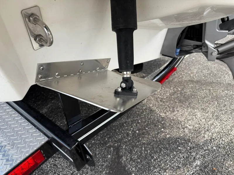 Slide: The Image of 2022 Cobalt R8 boat trim tab and trailer detail. - 9