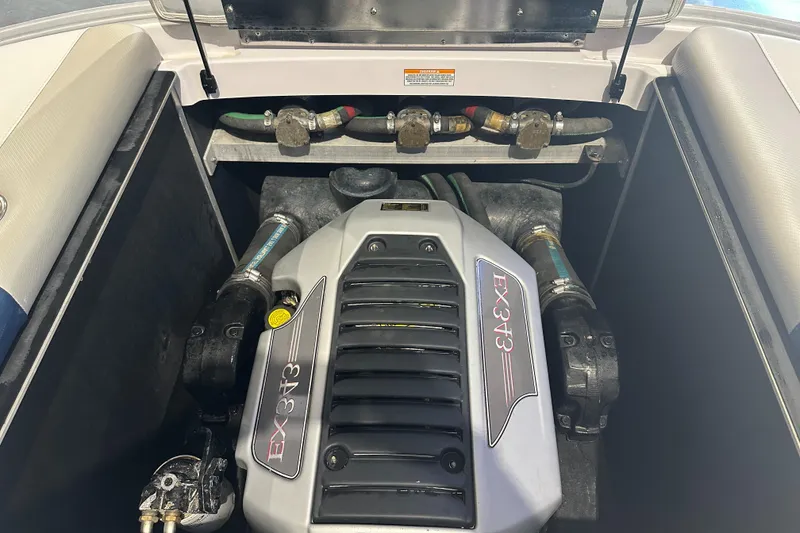 Slide: The Image of 2009 Nautique Super Air 210 engine compartment with EX343 engine. - 34