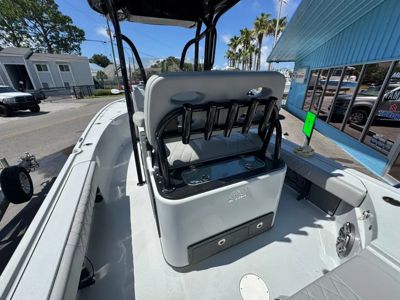 Slide: The Image of 2023 Blazer 2700 HYBRID BAY boat interior with seating and rod holders. - 14