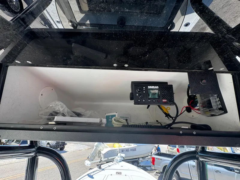 Slide: The Image of 2023 Blazer 2700 HYBRID BAY boat console with Simrad electronics and wiring. - 18