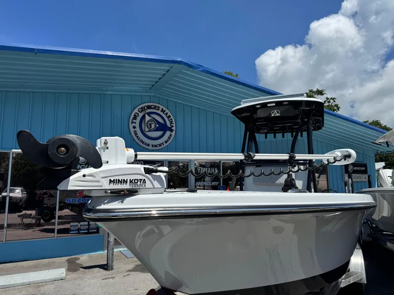 Slide: The Image of 2023 Blazer 2700 HYBRID BAY boat at Two George's Marina, featuring Minn Kota Terrova motor. - 22