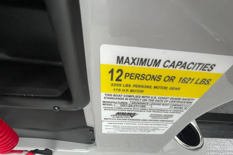 Slide: The Image of Maximum capacity label on 2026 Harris Cruiser 210, 12 persons or 1621 lbs. - 22