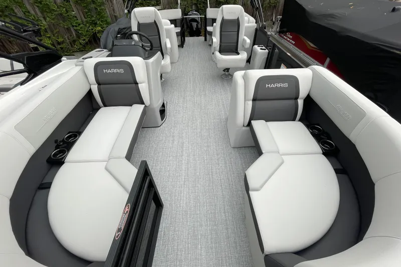 Slide: The Image of 2026 Harris Cruiser 210 boat interior with luxurious seating and modern design. - 28