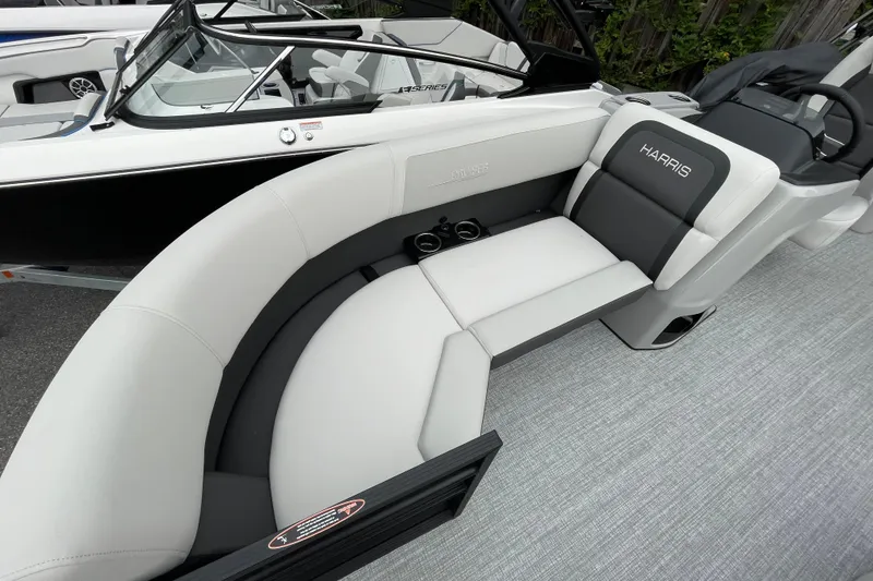 Slide: The Image of 2026 Harris Cruiser 210 boat interior with sleek seating and modern design. - 29