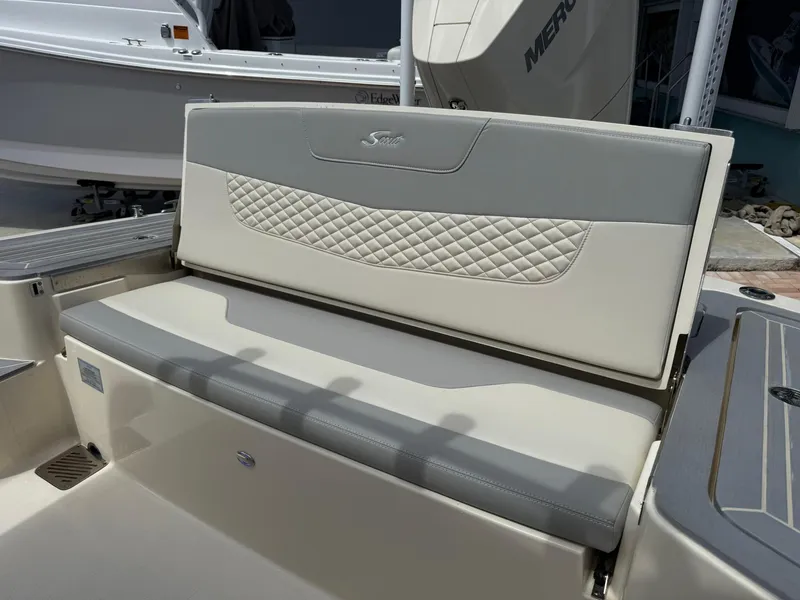 Slide: The Image of 2024 Scout 281 XSS boat seat with quilted design and gray accents. - 15