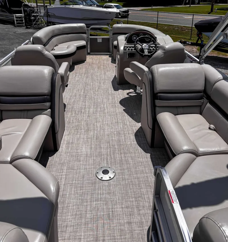 Slide: The Image of 2018 South Bay 200 Series S222RS 25 pontoon boat interior with plush seating. - 10