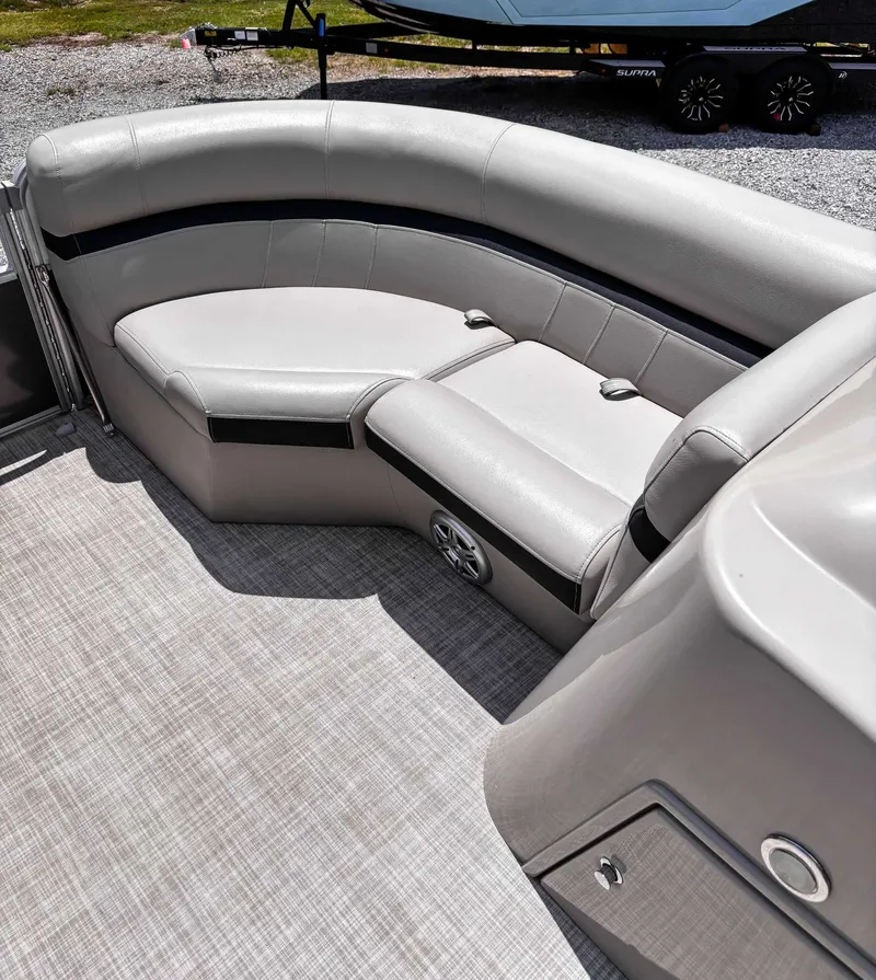 Slide: The Image of 2018 South Bay 200 Series S222RS 25 pontoon boat interior with gray seating and flooring. - 12