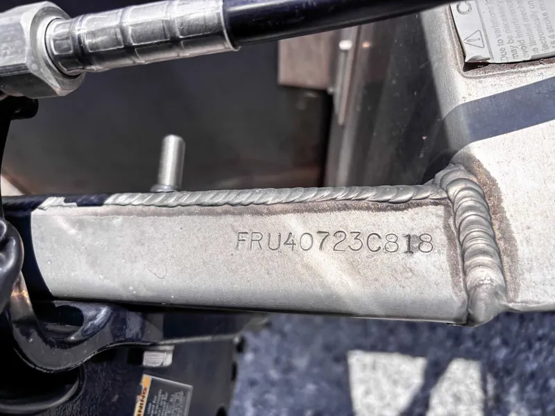 Slide: The Image of Close-up of a 2018 South Bay 200 Series S222RS 25 boat's metal part with serial number. - 19