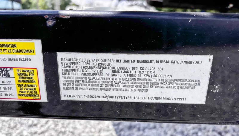 Slide: The Image of Label on a 2018 South Bay 200 Series S222RS 25 trailer, showing specifications and safety information. - 20
