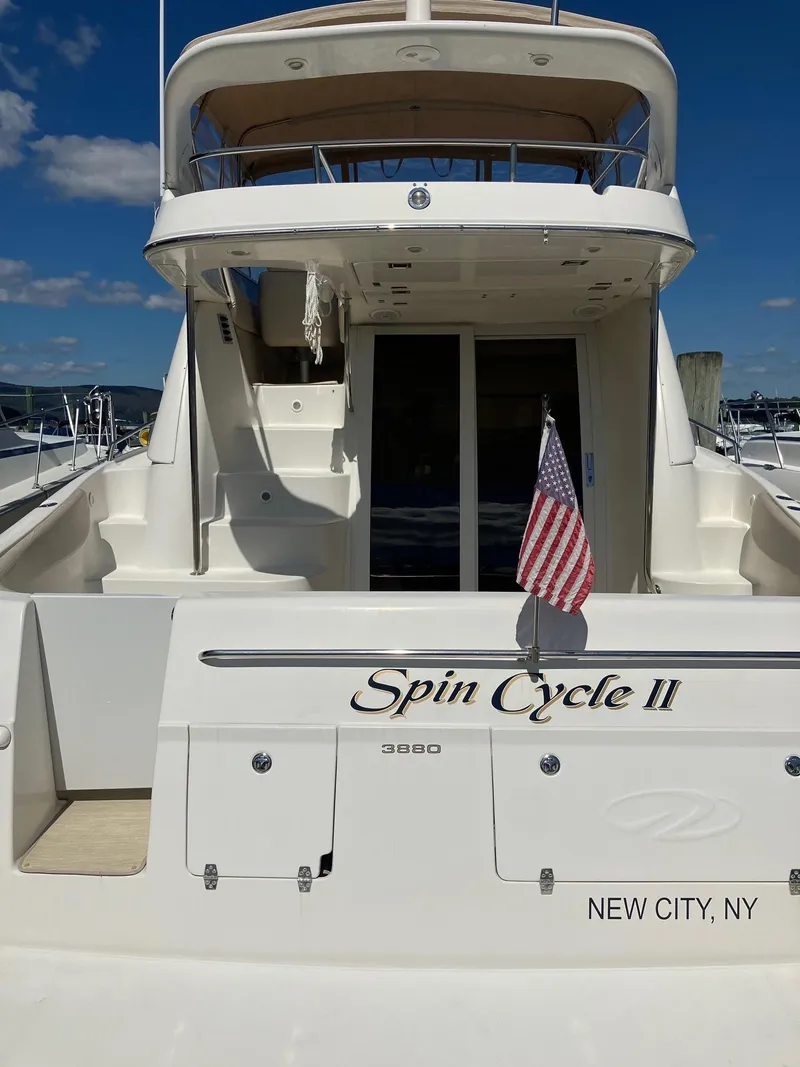 Slide: The Image of 2002 Regal Commodore 3880 yacht "Spin Cycle II" docked in New City, NY. - 1