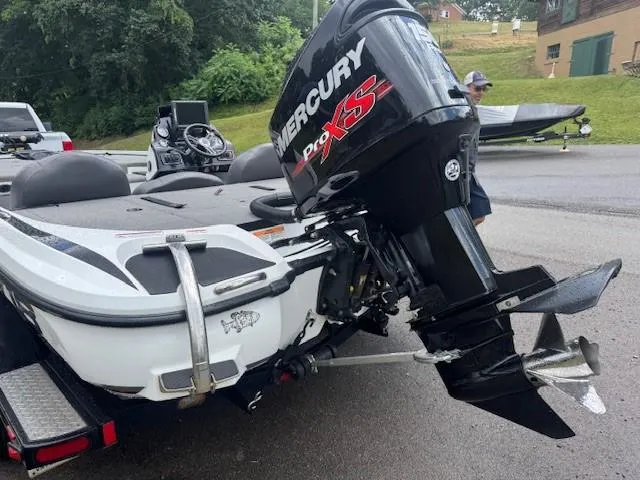 Slide: The Image of 2016 Nitro Z18 boat with Mercury Pro XS engine on a trailer. - 11