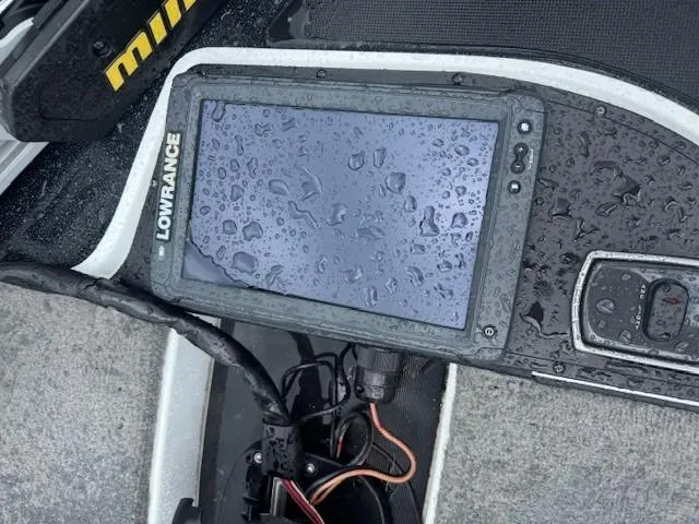 Slide: The Image of Lowrance fish finder on a 2016 Nitro Z18 boat, wet with raindrops. - 5