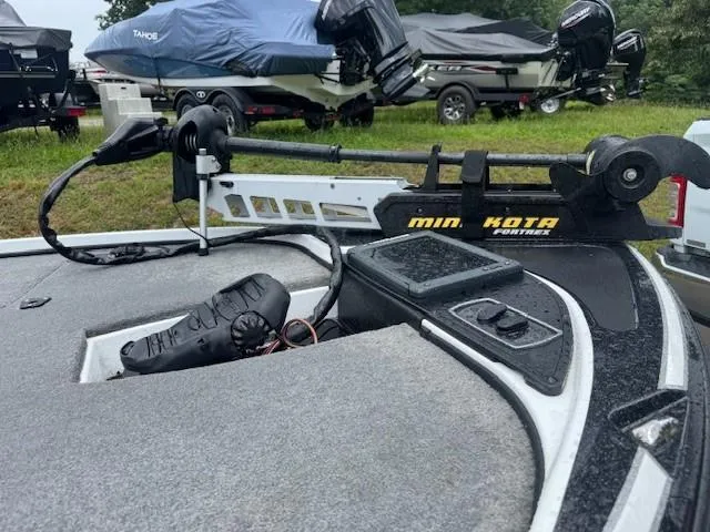 Slide: The Image of Boat deck with Minn Kota Fortrex trolling motor, Nitro Z18 model, 2016, in a grassy area. - 6