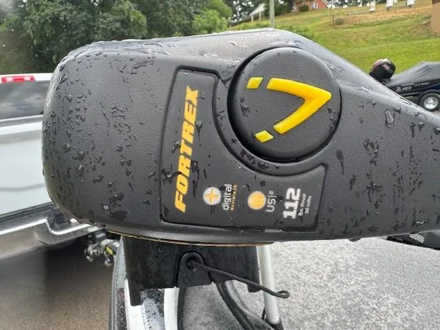 Slide: The Image of Close-up of a Fortrex trolling motor on a 2016 Nitro Z18 boat, wet from rain. - 7