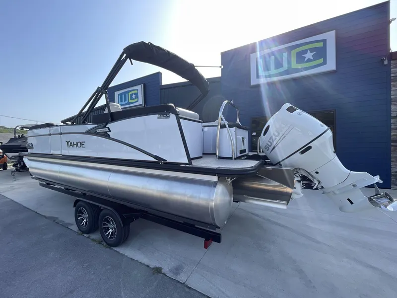 Slide: The Image of 2024 Tahoe Pontoon 23 Cascade Versatile Rear Lounger with Suzuki outboard motor on trailer. - 6