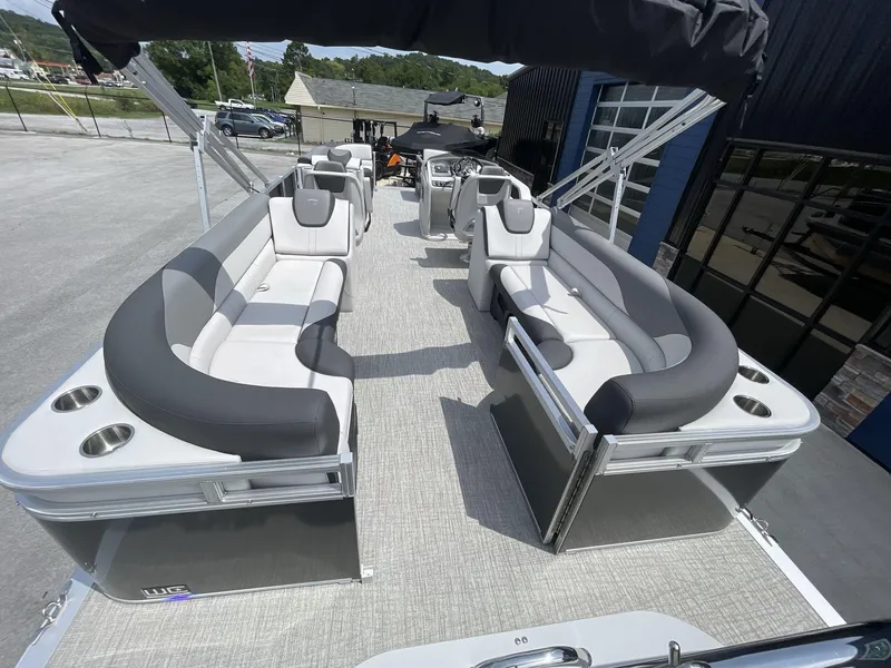 Slide: The Image of 2024 Tahoe Pontoon 25 LSZ QL with spacious seating and modern design. - 15
