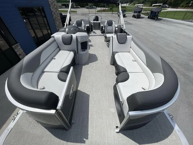 Slide: The Image of 2024 Tahoe Pontoon 25 LSZ QL with spacious seating and modern design. - 25