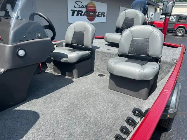 Slide: The Image of 2022 Tracker Bass Tracker Classic XL boat interior with gray seats and steering console. - 3