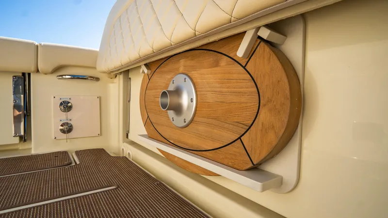 Slide: The Image of 2025 Chris-Craft Catalina 30 interior detail with wooden accents and luxurious seating. - 11