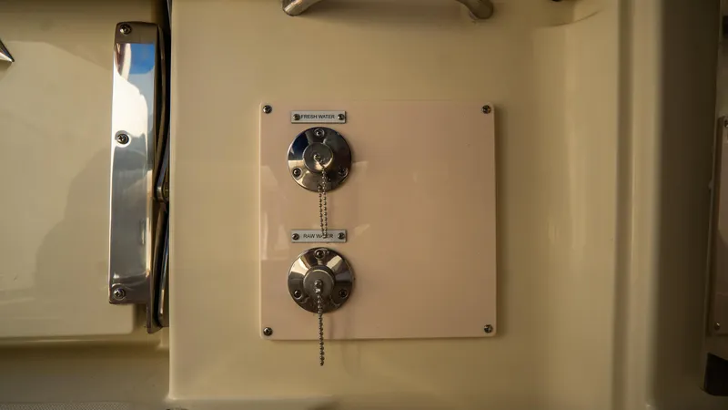 Slide: The Image of 2025 Chris-Craft Catalina 30 boat fuel and water fill ports. - 12