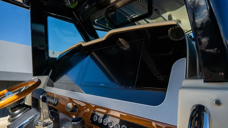 Slide: The Image of 2025 Chris-Craft Catalina 30 dashboard with modern controls and sleek design. - 27